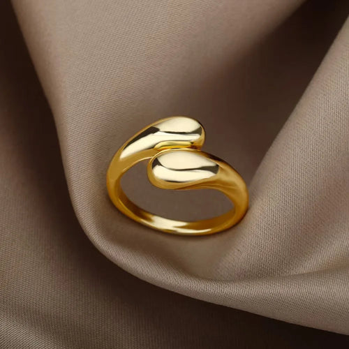 A ladies' stainless steel glossy double-ball open gold ring